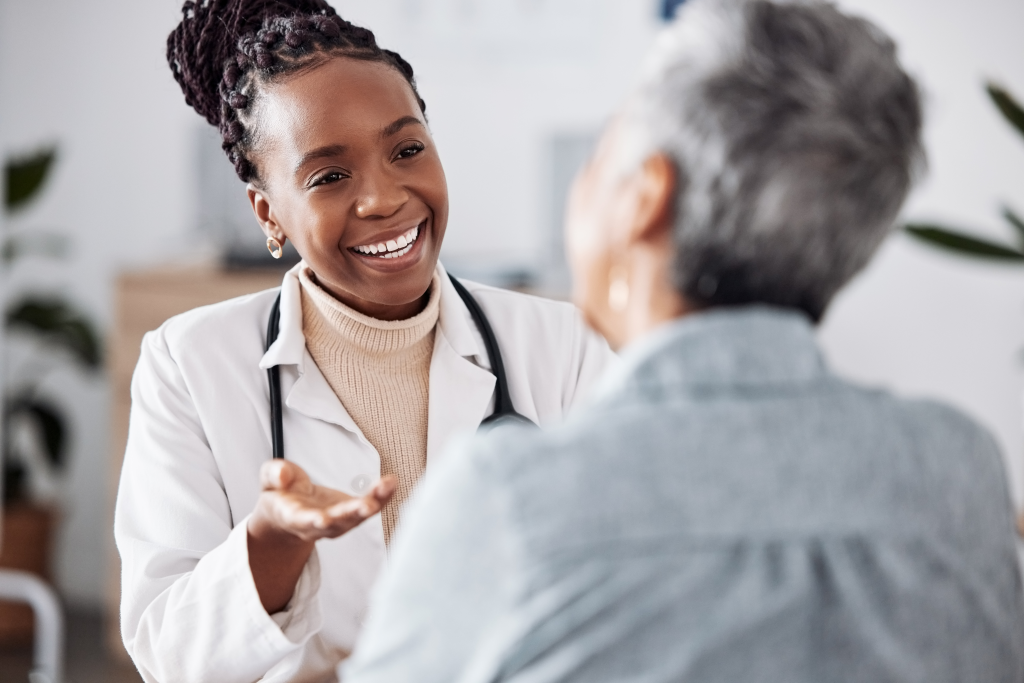 Woman talking to doctor