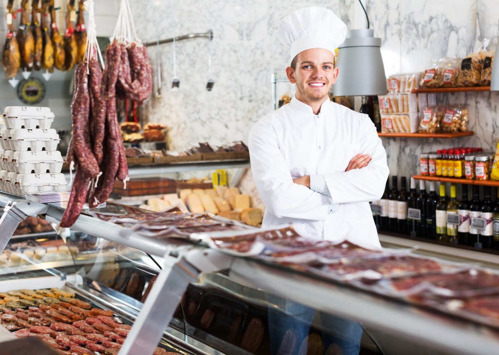 Butcher in shop
