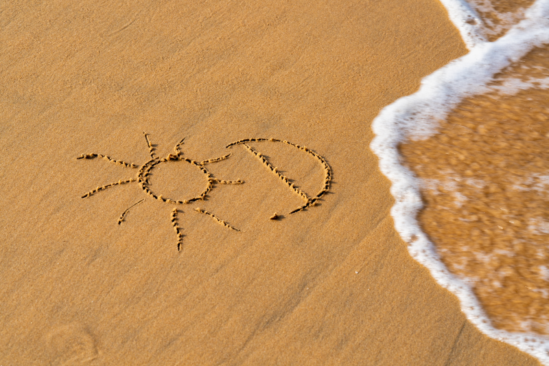 Vitamin D written in the sand