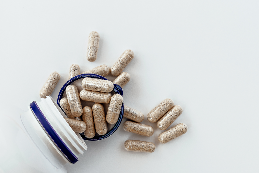 a bottle of pills spilling out of it