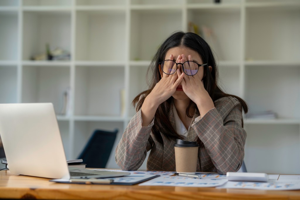 Stressed woman at work