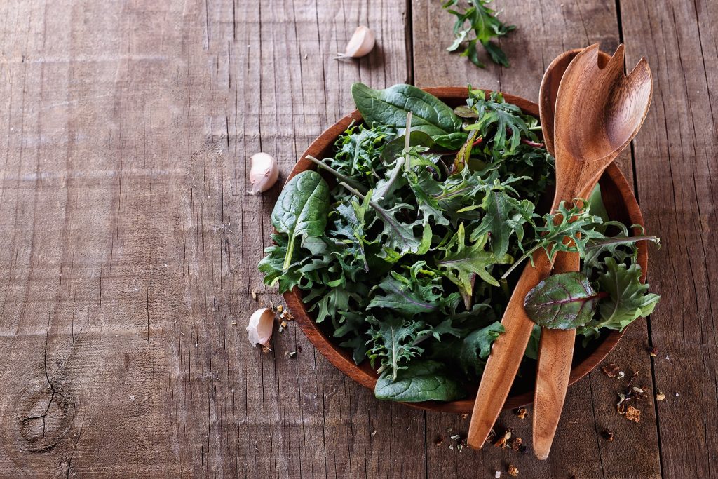 Green leafy vegetable salad and garlic