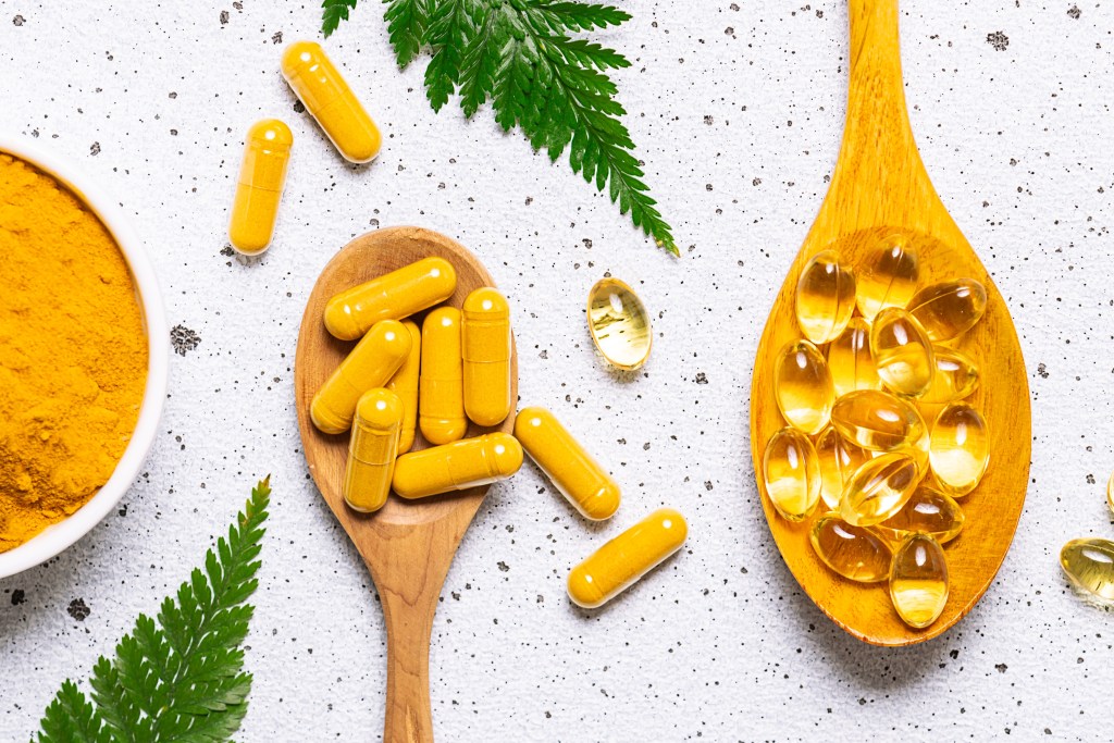 turmeric and omega-3 vitamin capsules
