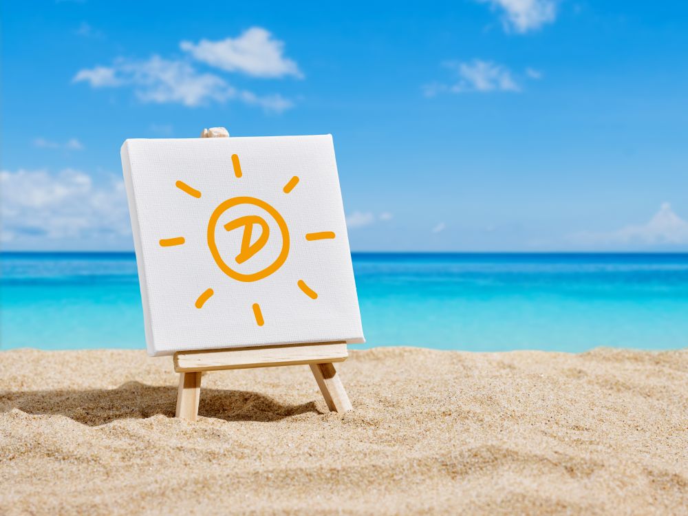 Vitamin D sign on the beach