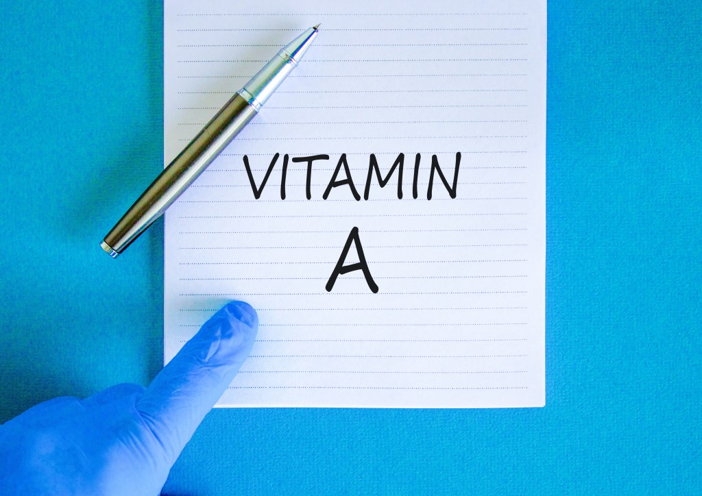 Doctor pointing to vitamin A