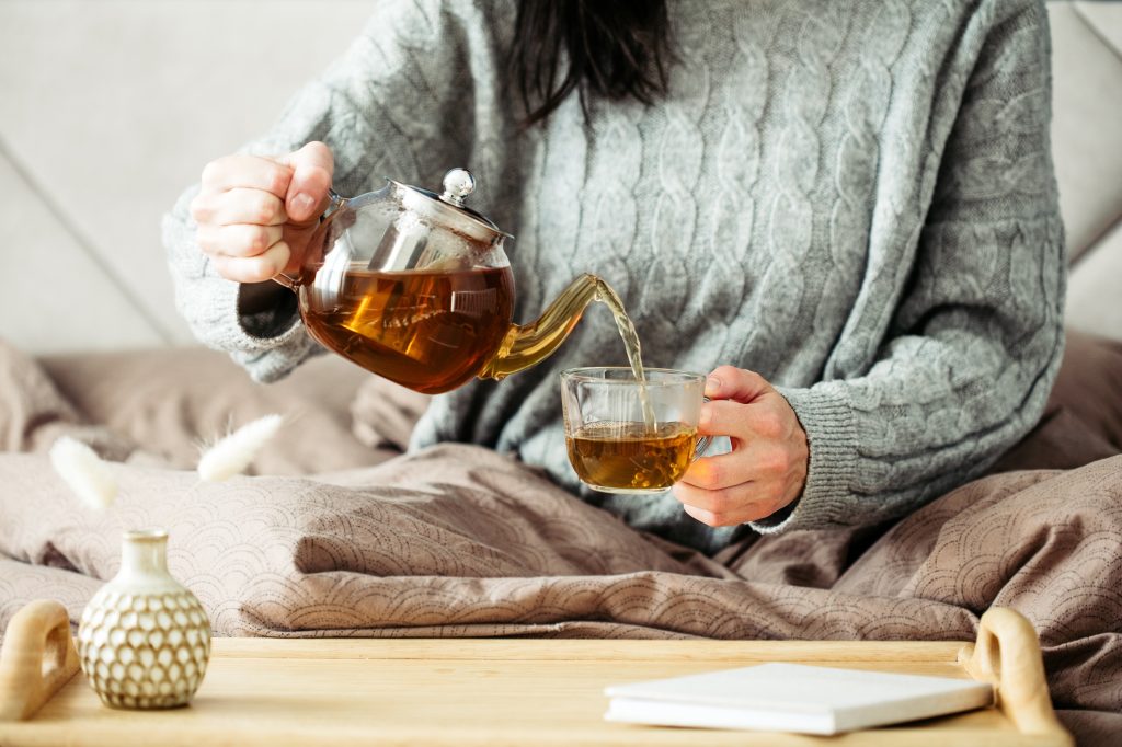 Woman with a teapot