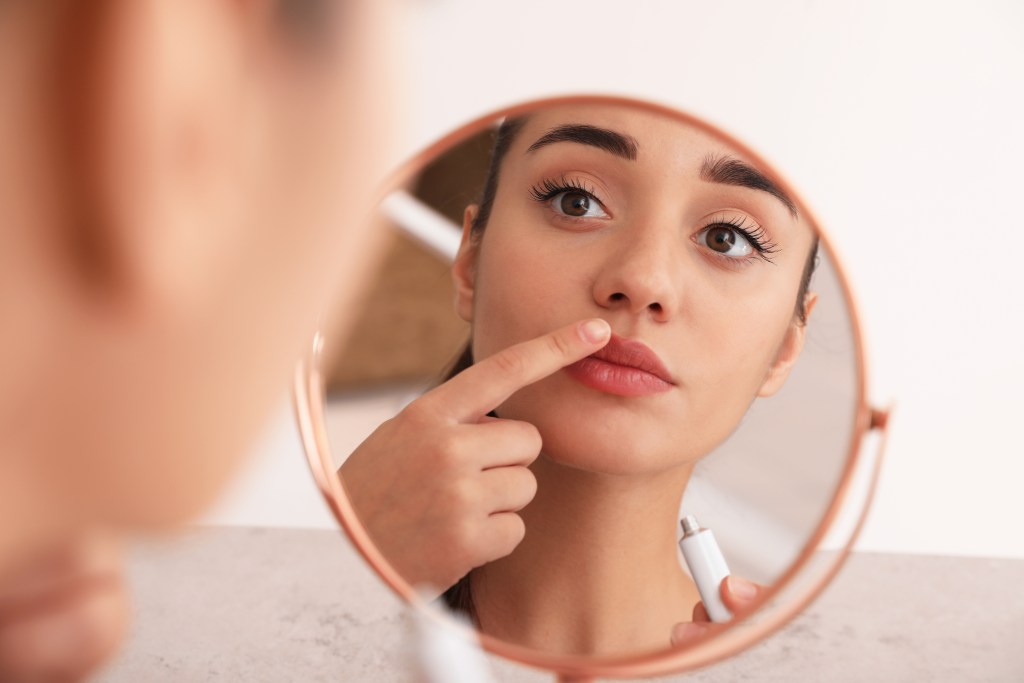 Woman applying cream