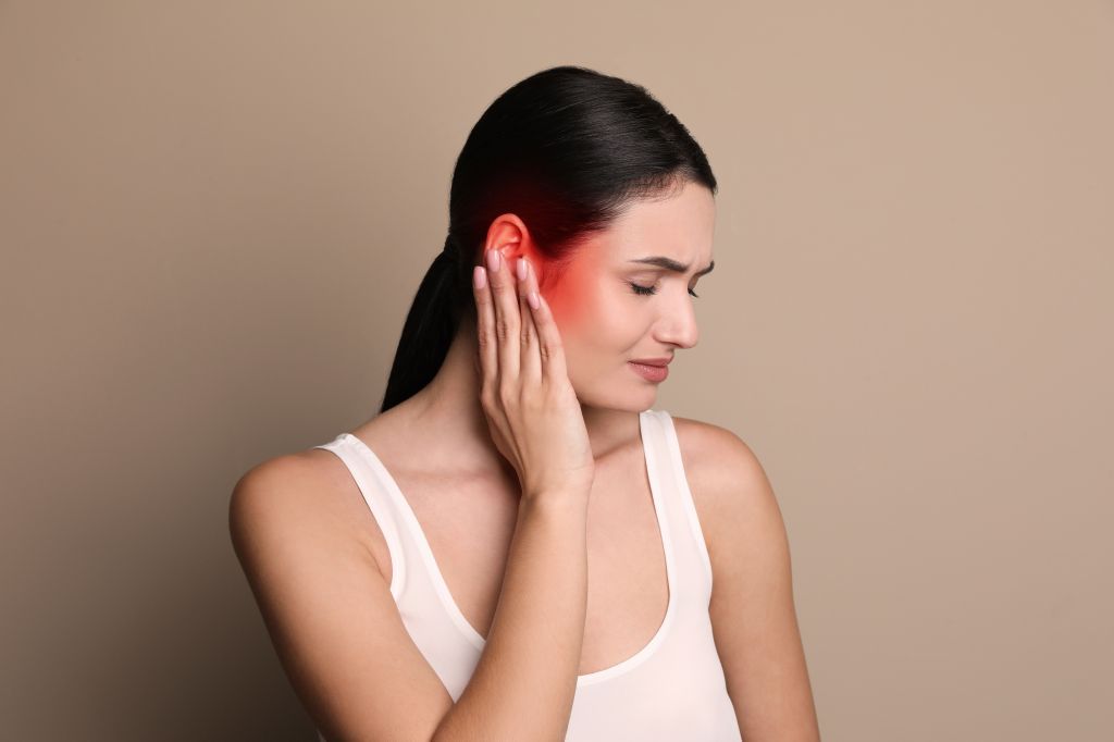 Woman with ear pain 