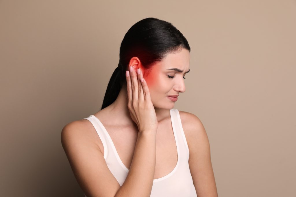 Woman with ear pain
