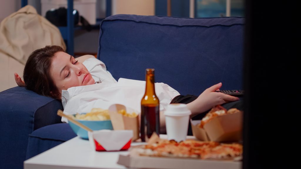 A woman asleep on the couch