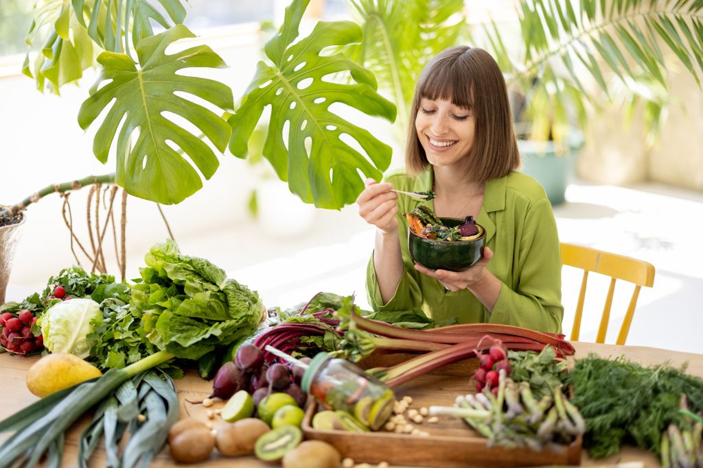Woman eating leafy greens