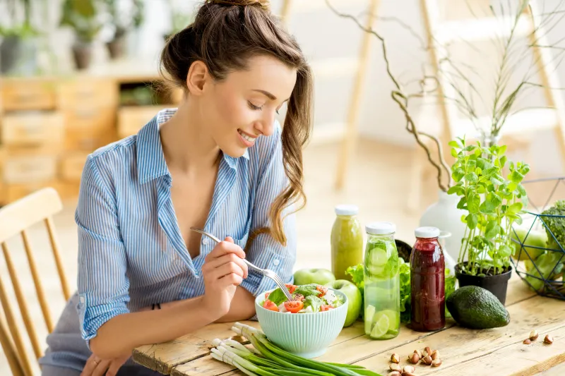 Woman eating a salad
