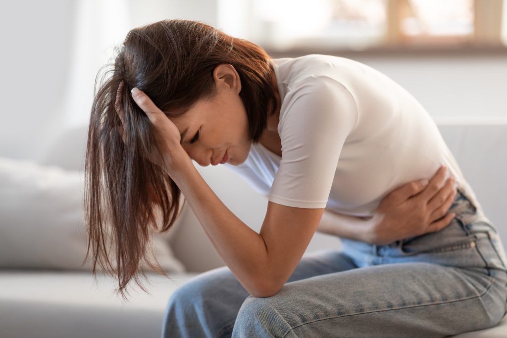 Young woman in pain