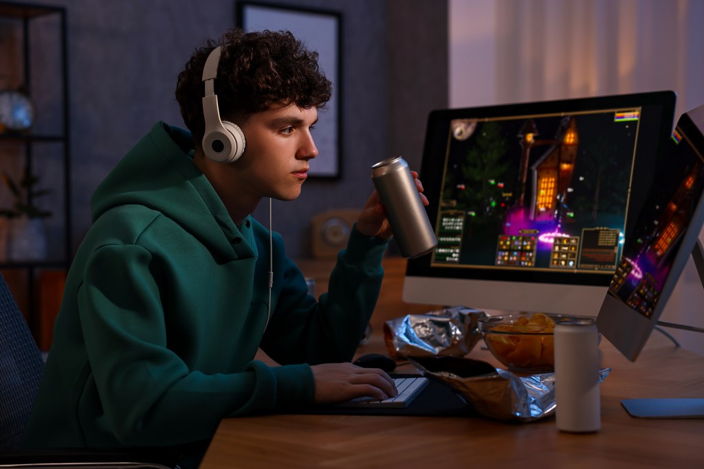 Young man with energy drink