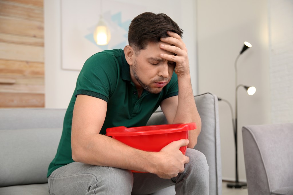 Man feeling nauseated