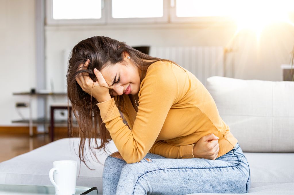 Woman with stomach ache  