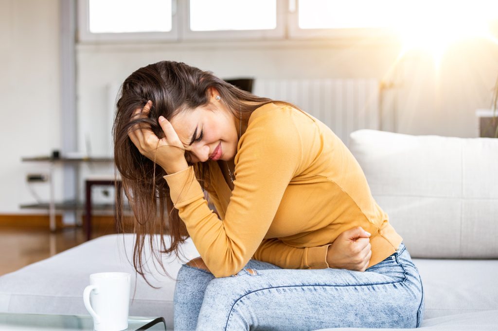 Woman with stomach ache  