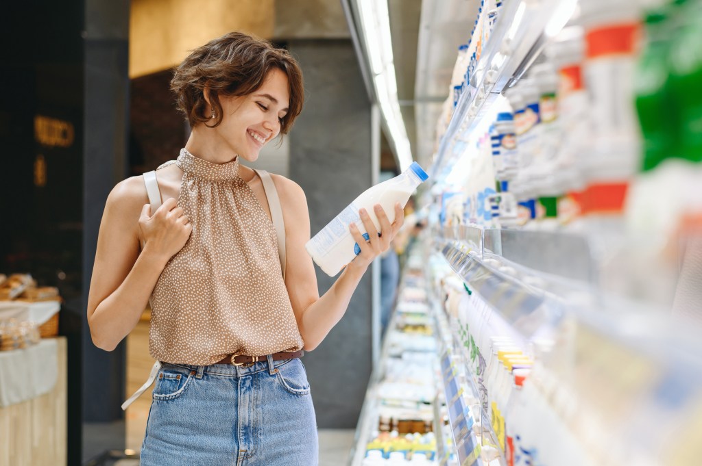 Woman buying kefir