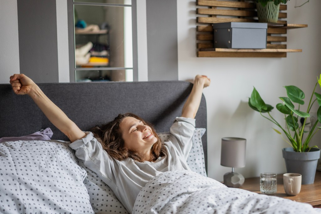 Woman happy waking up