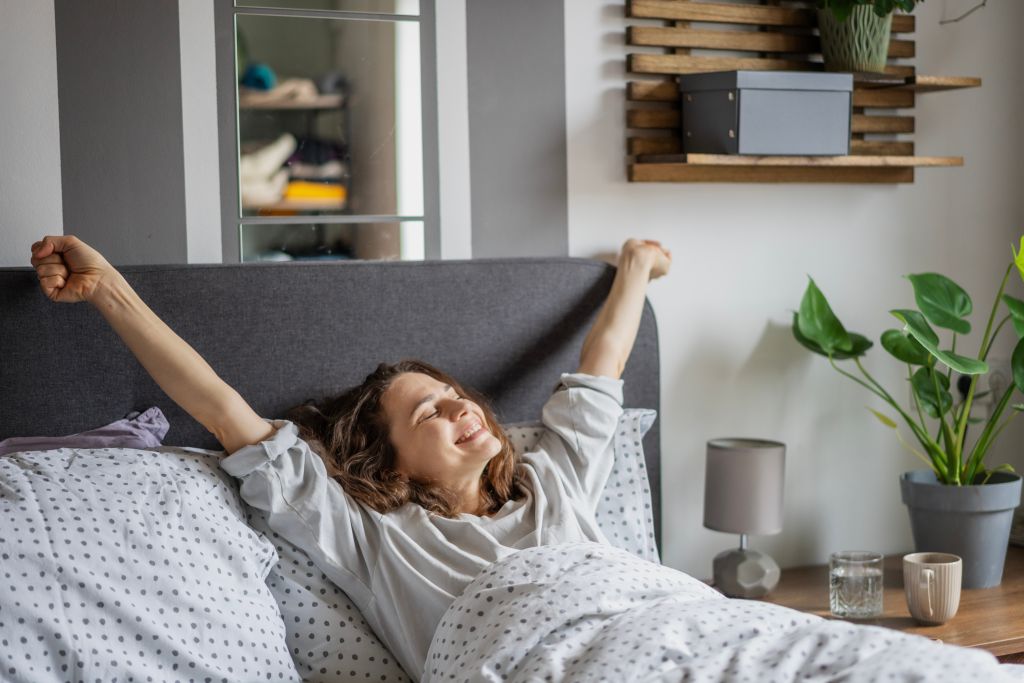 Woman happy waking up