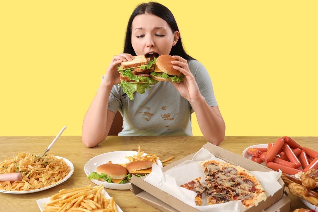 woman eating junk food