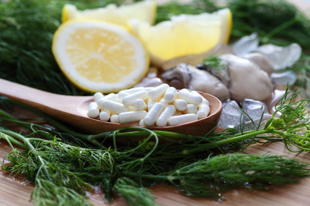 Zinc capsules with fresh oysters