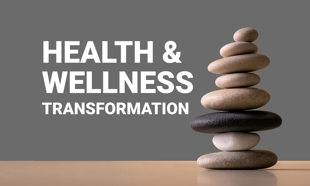 Stacked stones with wellness text