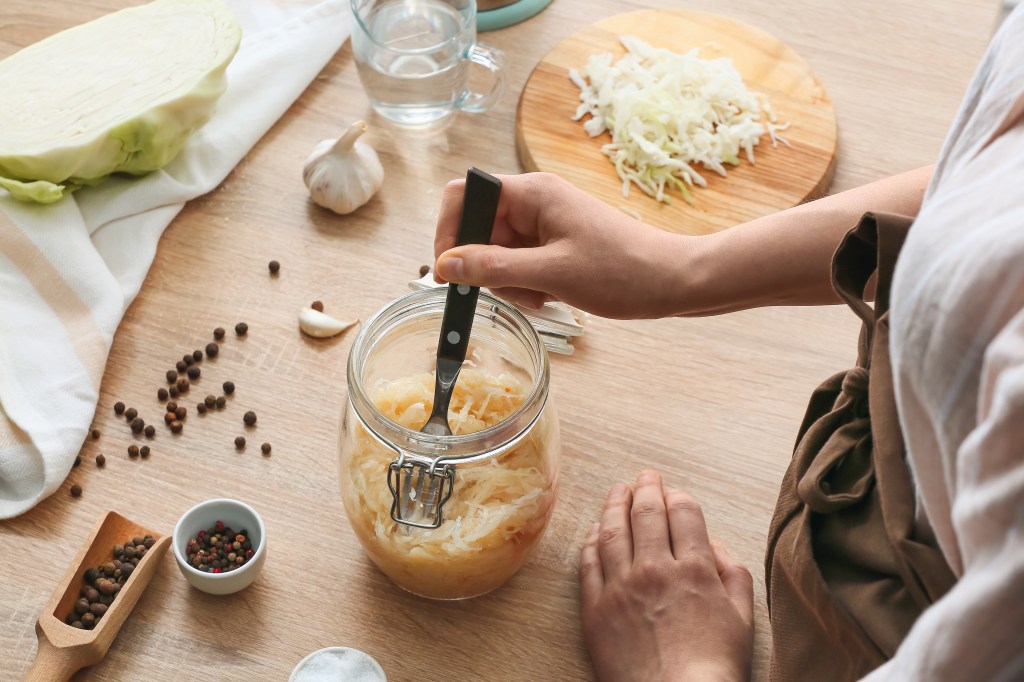 Woman eating fermented foods