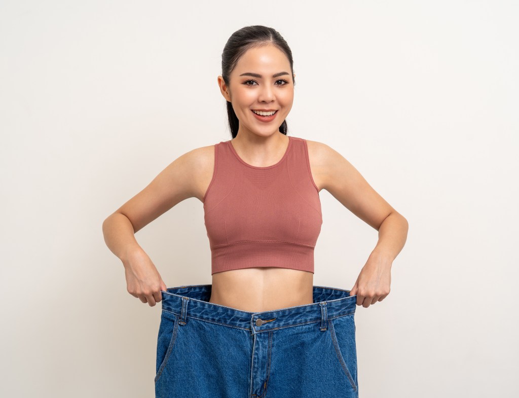 Woman in baggy jeans