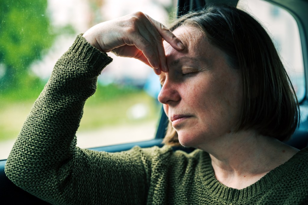 Woman with motion sickness