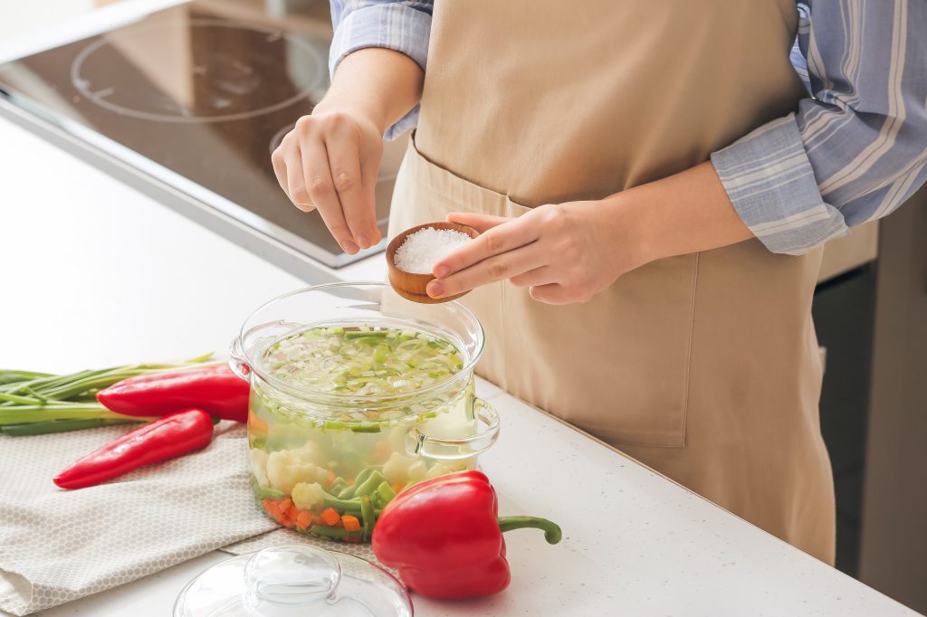 Adding salt to dish