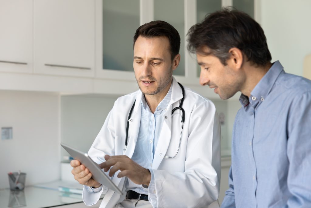 Man speaking to his doctor 