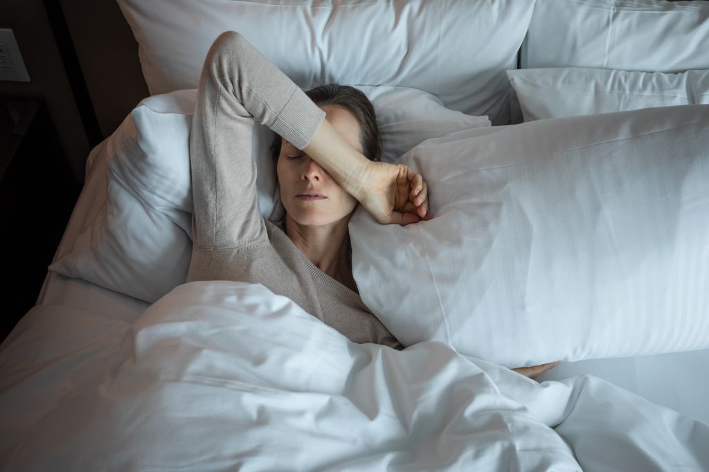Woman waking up tired