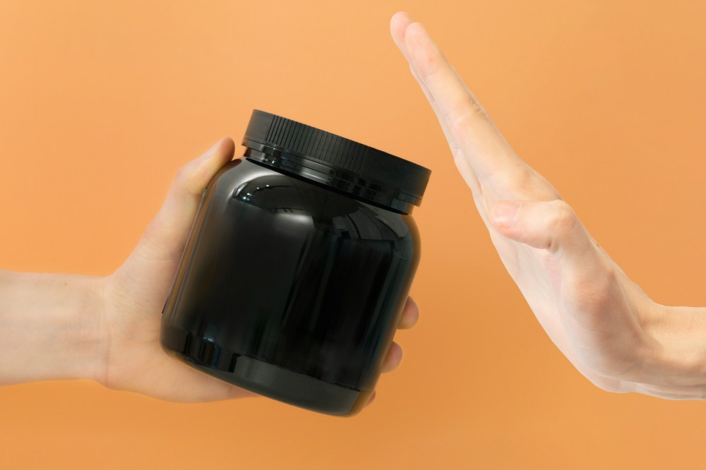 Hand refusing a supplement