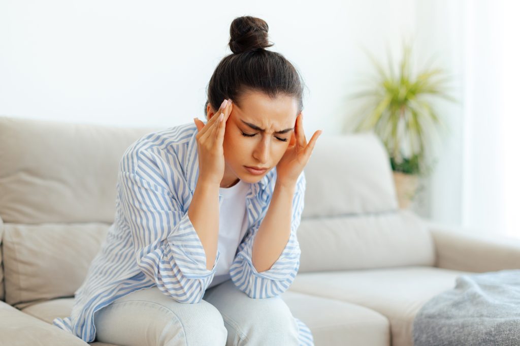 Woman with headaches 