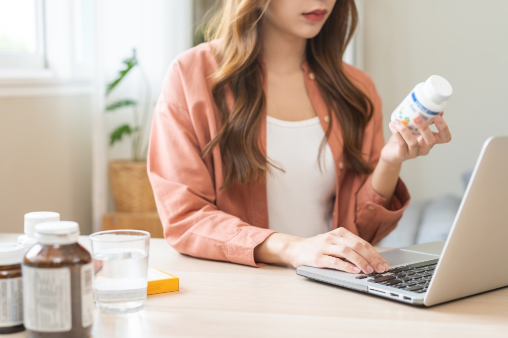 Woman researching supplements