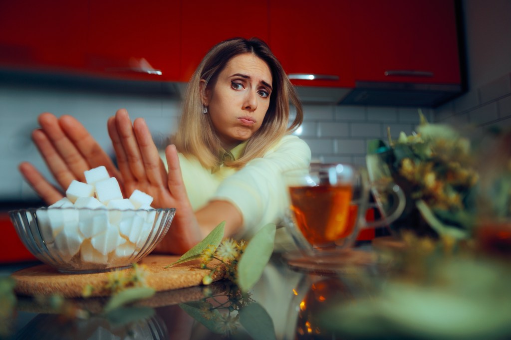 Woman saying no to sugar 