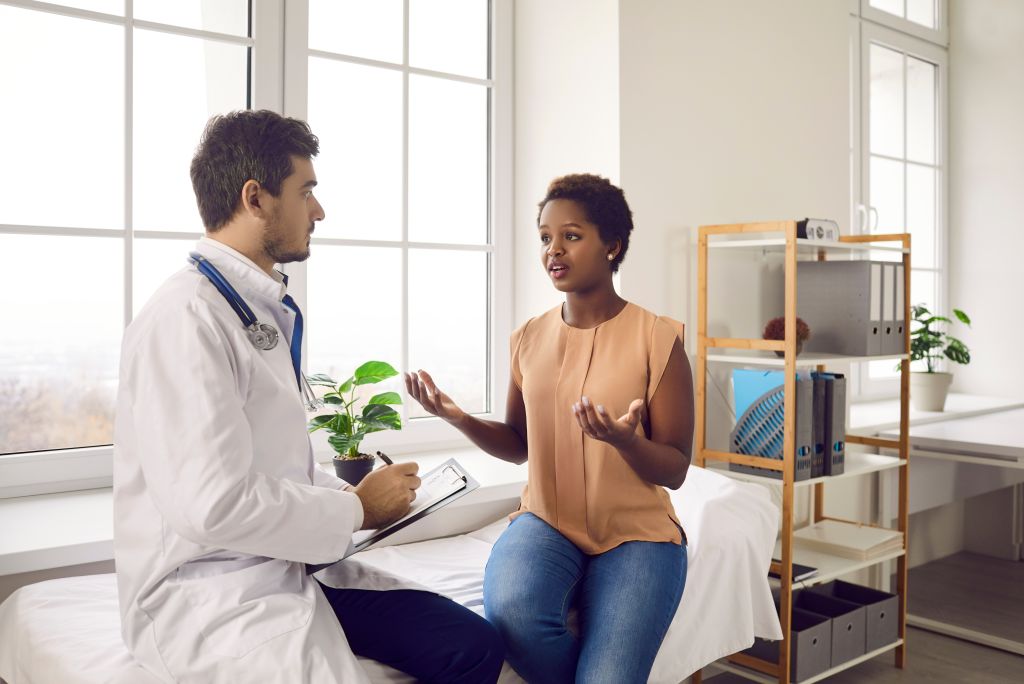 Patient speaking with her doctor