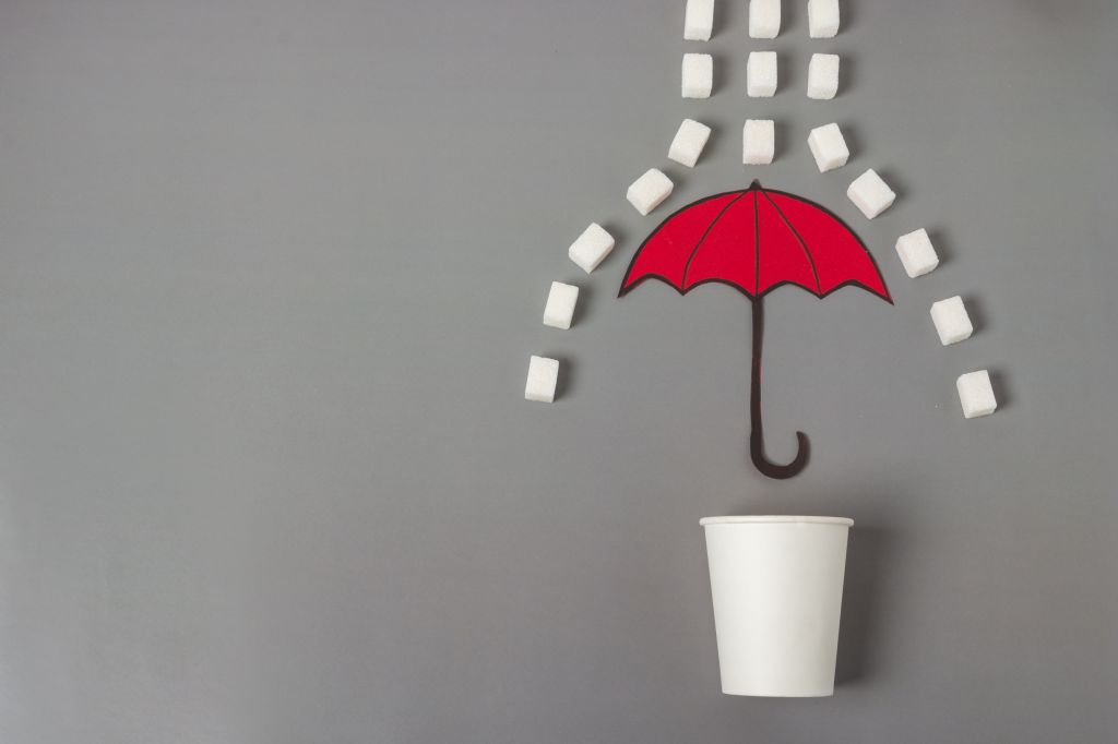 Umbrella protecting cup from sugar