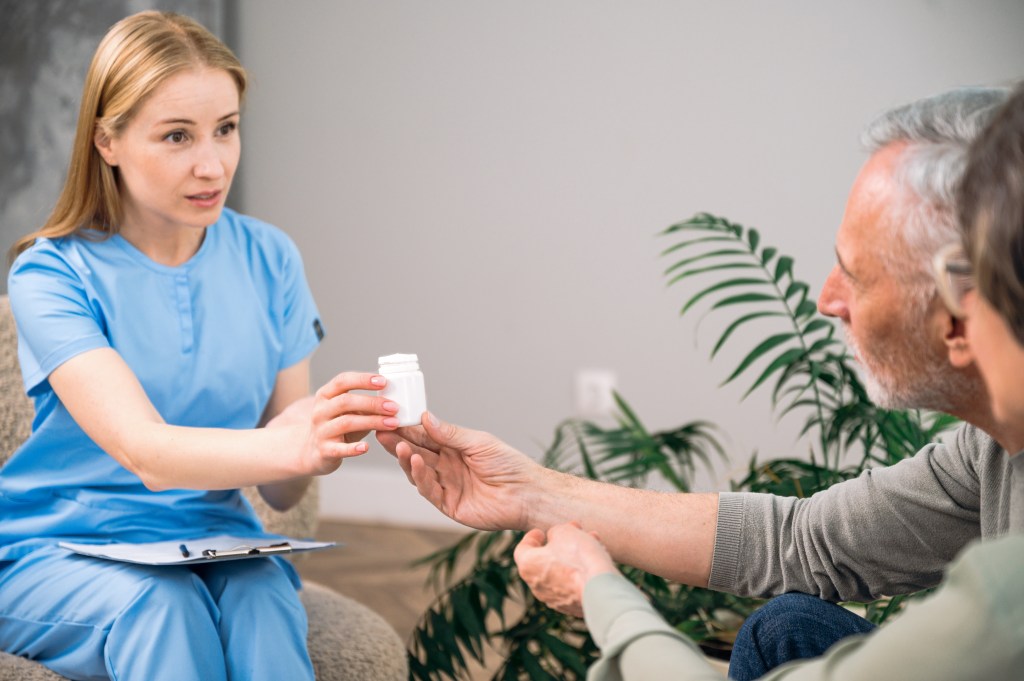Couple discussing supplementation with a doctor