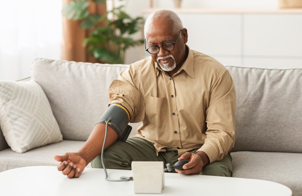 Man taking his blood pressure 