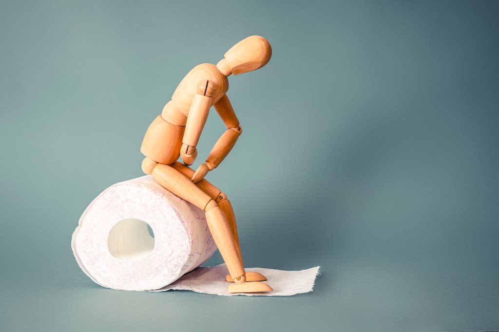 Constipation model on toilet paper