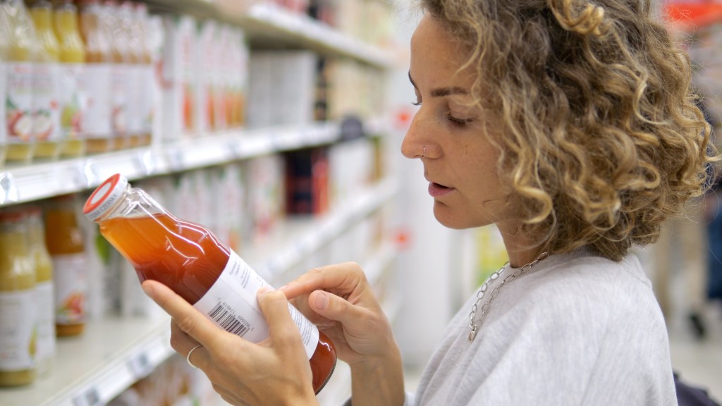Woman reading a nutrition label