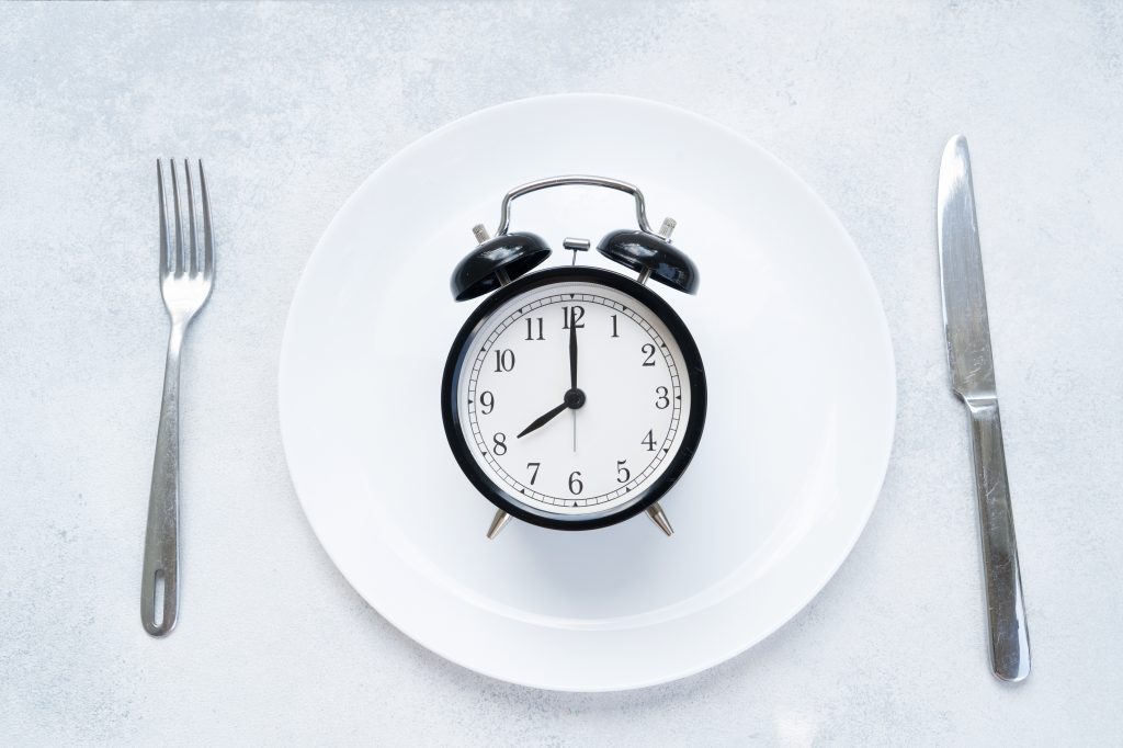 Clock on an empty plate