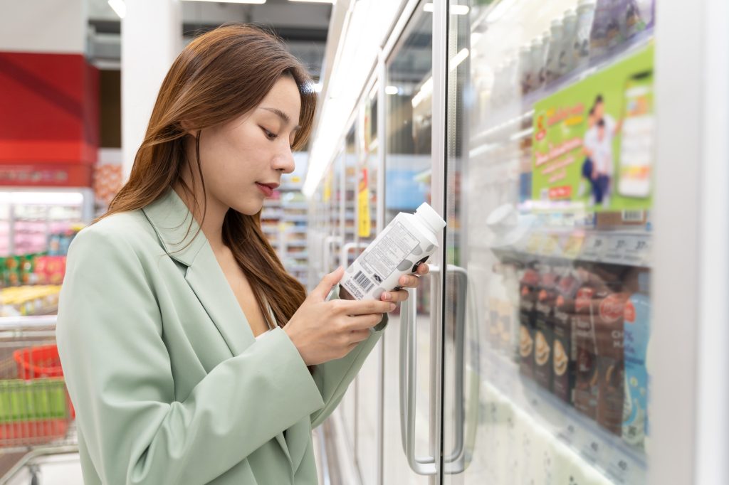 Women reading a label
