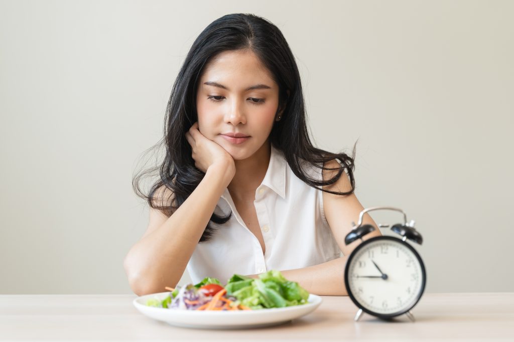 Woman looking at her meal