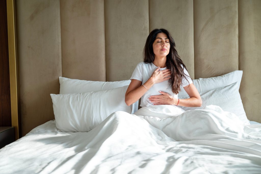 Woman practicing deep breathing