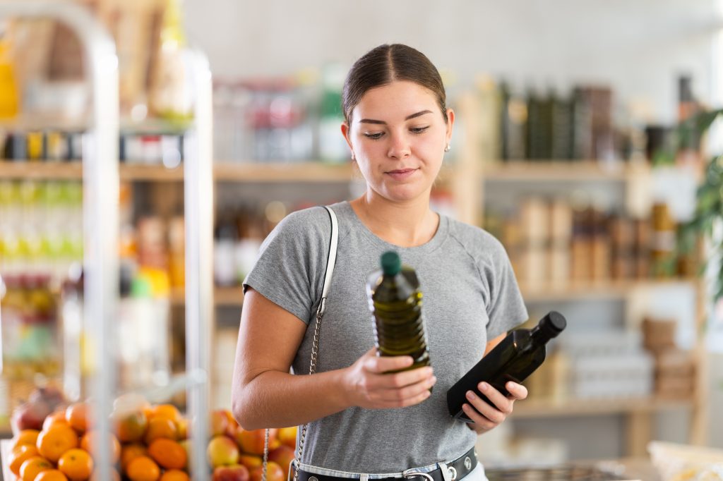 Woman choosing oil