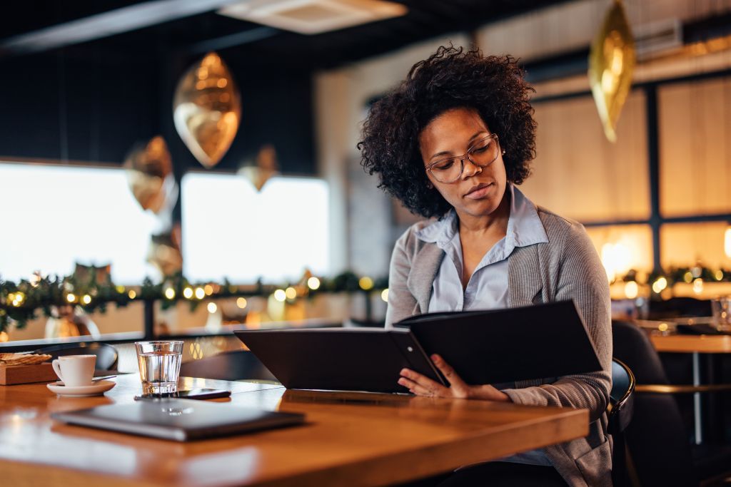 Woman looking at menu