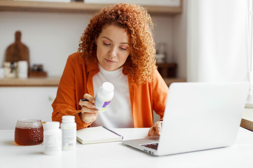 Women researching different supplements